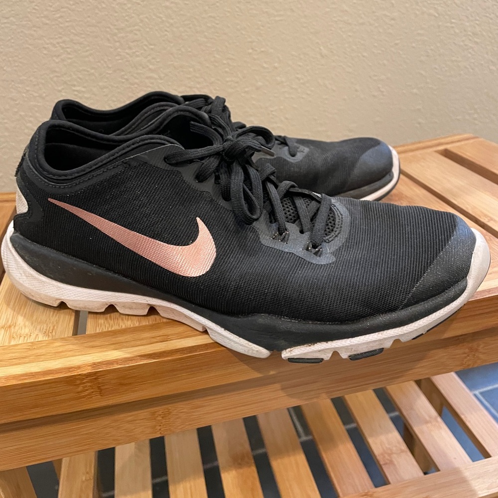 Black and gold Nikes